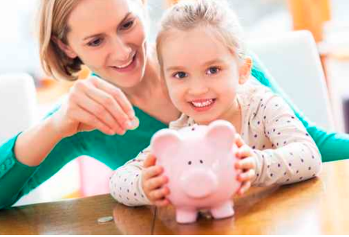 mom and daughter with piggy bank